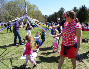 Dancing around the maypole in Pierce Park.